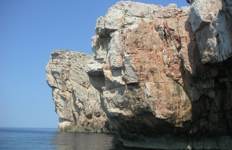 Kornati Islands Cliffs/Crowns. Rašip Veli. Kornati cliff in the shape of a human head.
