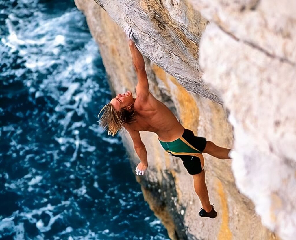 Leo Houlding Deep Water Soloing on the cliff of Panitula Island, in the Kornati Archipelago.